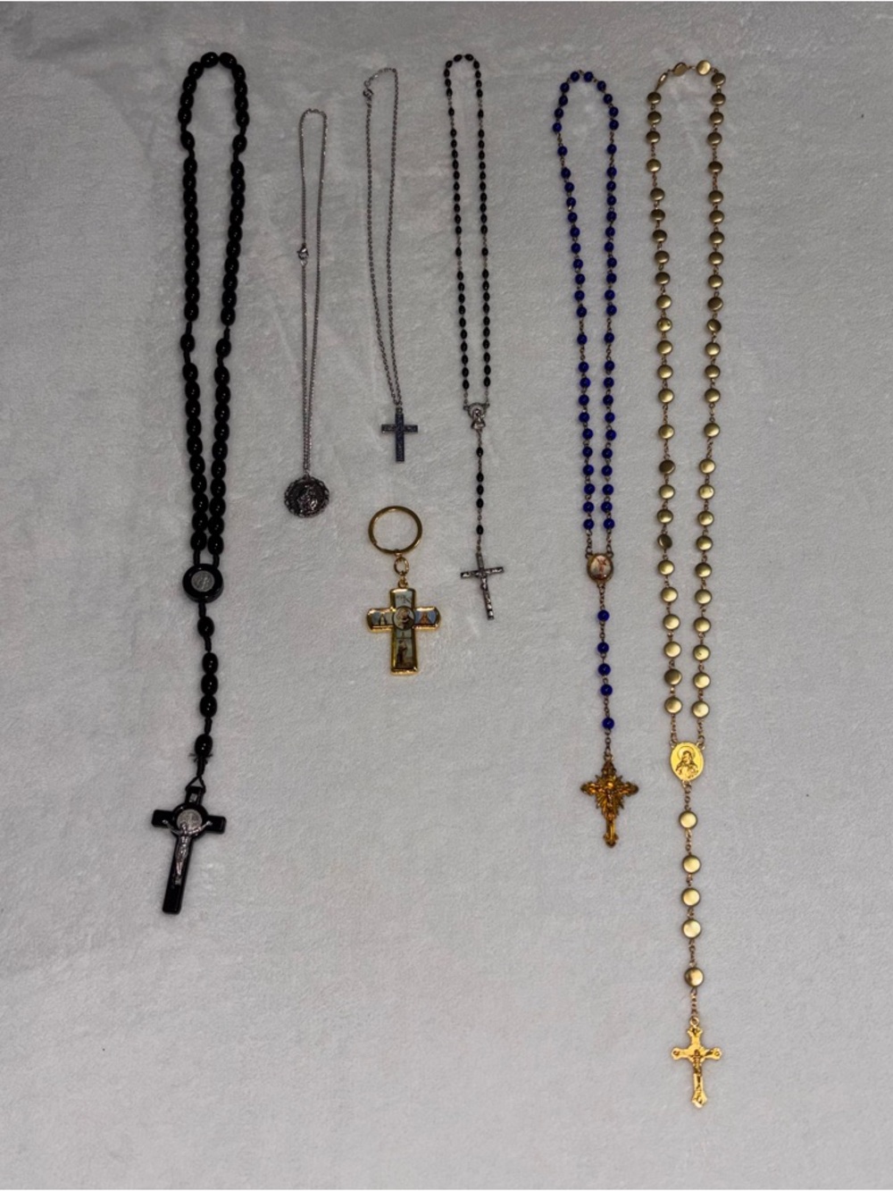 Bundle of Rosary Beads and Religious Accessories